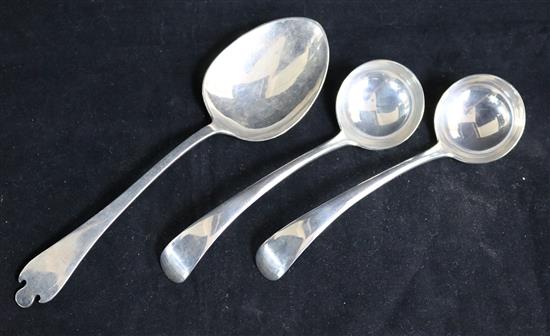 A pair of Edwardian silver Old English pattern sauce ladles by Josiah Williams & Co, London, 1903 & a sterling trefid spoon.